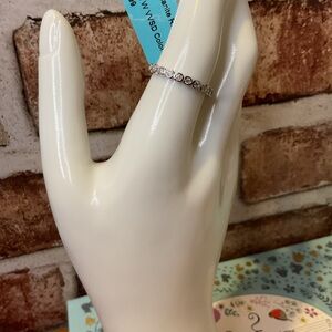 0.76 CTW Round Moissanite & 925 Sterling Silver Infinity Band Ring Size 8